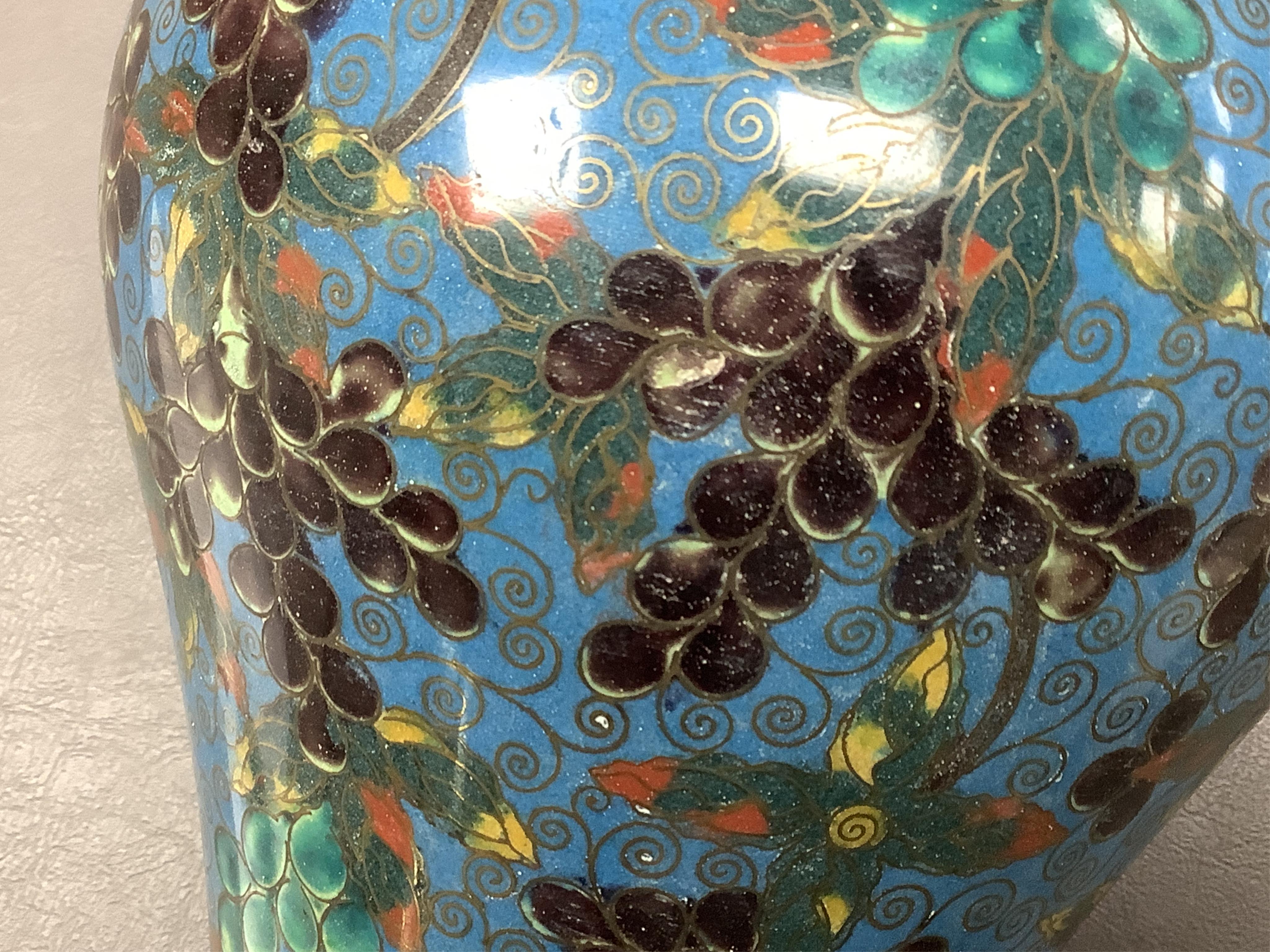 A late 19th / early 20th century Chinese cloisonné enamel 'Squirrel and vine' meiping, 27cm